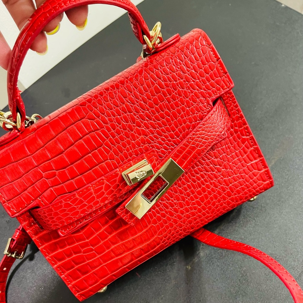 Small cute bag , like new.Red and gold.